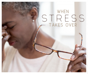 stressed woman removing glasses